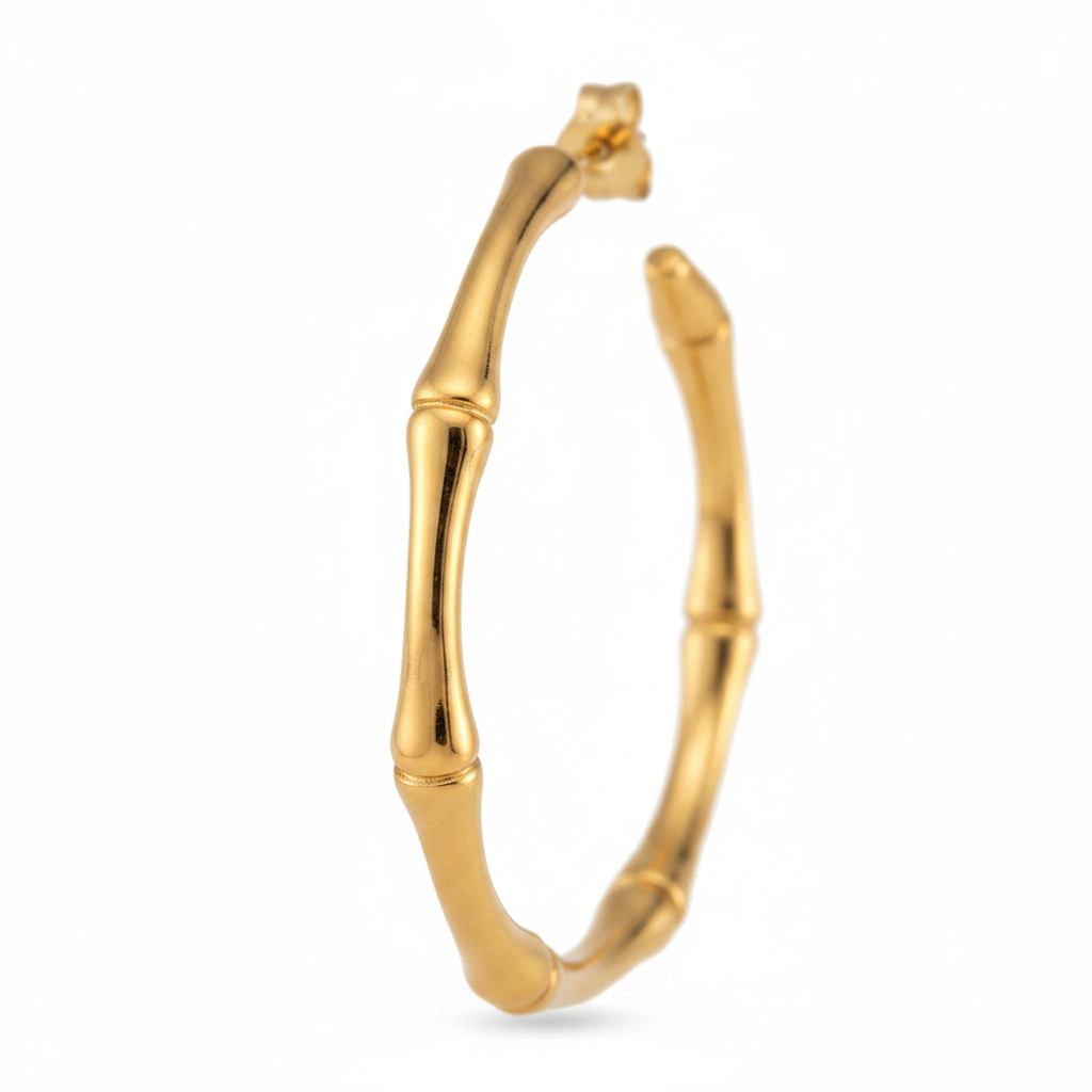 Close-up of gold bamboo joint texture and polished finish on hoop earrings