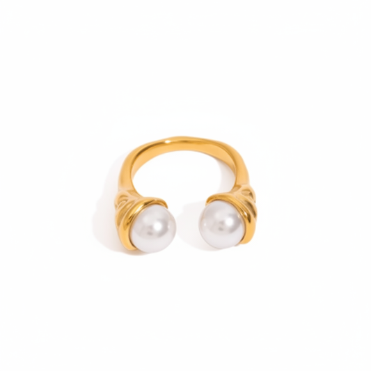 Gold open pearl ring on clean white background